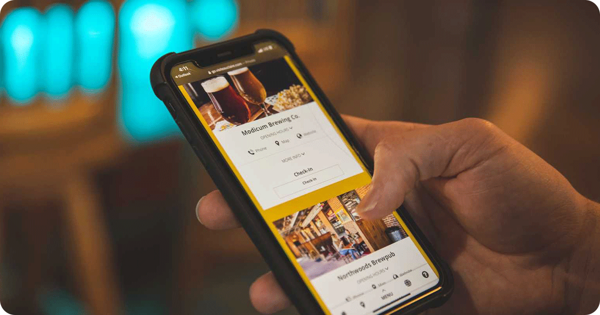 Person scrolling on their smartphone.